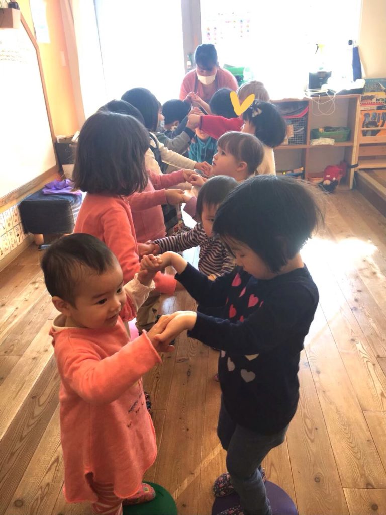 kids playing at ryozan park preschool in tokyo